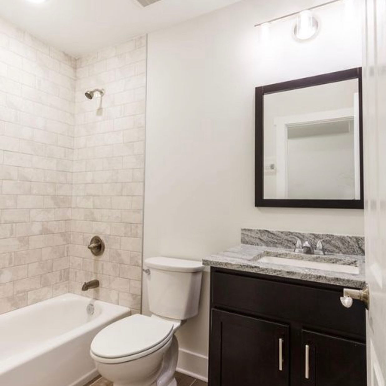 Bathroom with marble-look subway tile